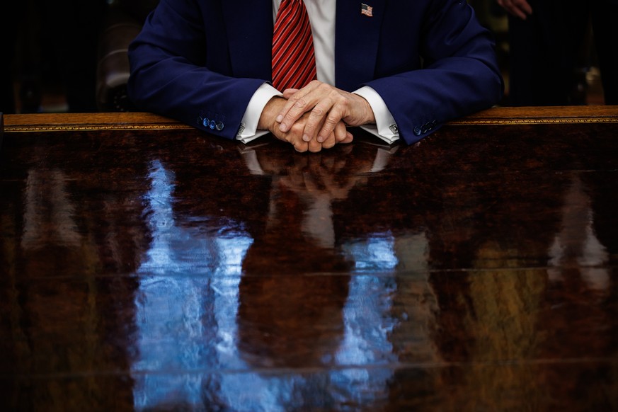 epa12129410 US President Donald Trump takes questions from reporters after signing executive orders on nuclear energy in the Oval Office of the White House, Washington, D.C., USA, 23 May 2025. Trump s ...