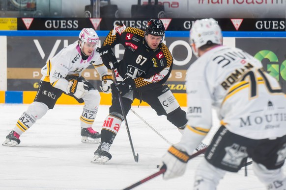From left Louis Robin (HCA), Jiri Sekac (HCL) and Matteo Romanenghi (HCA), during the regular season of National League Swiss Championship 2024/25 between HC Lugano and HC Ajoie at the ice stadium Cor ...