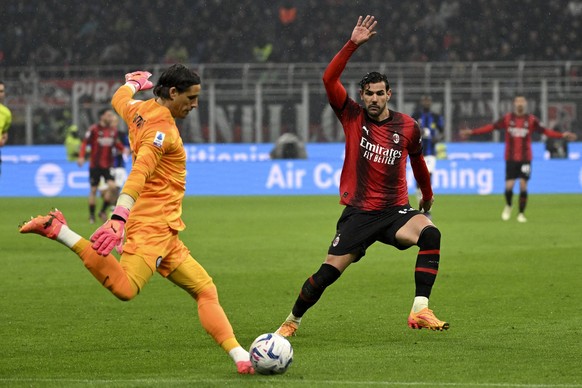 Yann Sommer of FC Internazionale and Theo Hernandez of AC Milan during the Serie A football match between AC Milan and FC Internazionale at San Sirostadium stadium in Milan Italy, April 22nd, 2023. an ...
