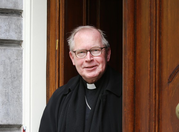 epa12048786 Cardinal Wim Eijk leaves the archdiocesan palace in Utrecht, The Netherlands, 23 April 2025. The head of the Roman Catholic Church in the Netherlands will attend the funeral of Pope Franci ...